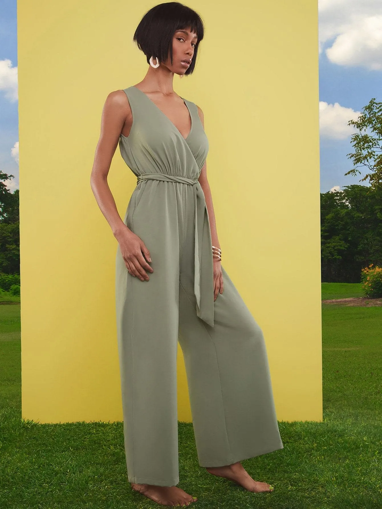 Green Surplice V-Neck Sleeveless Self Belted Wide Leg Jumpsuit