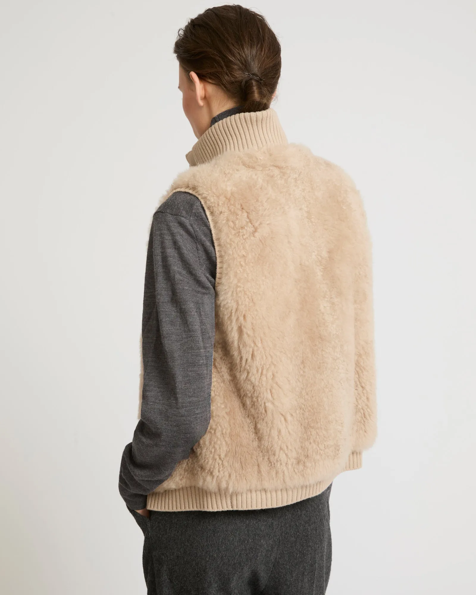 Short gilet in merino knit and lambskin